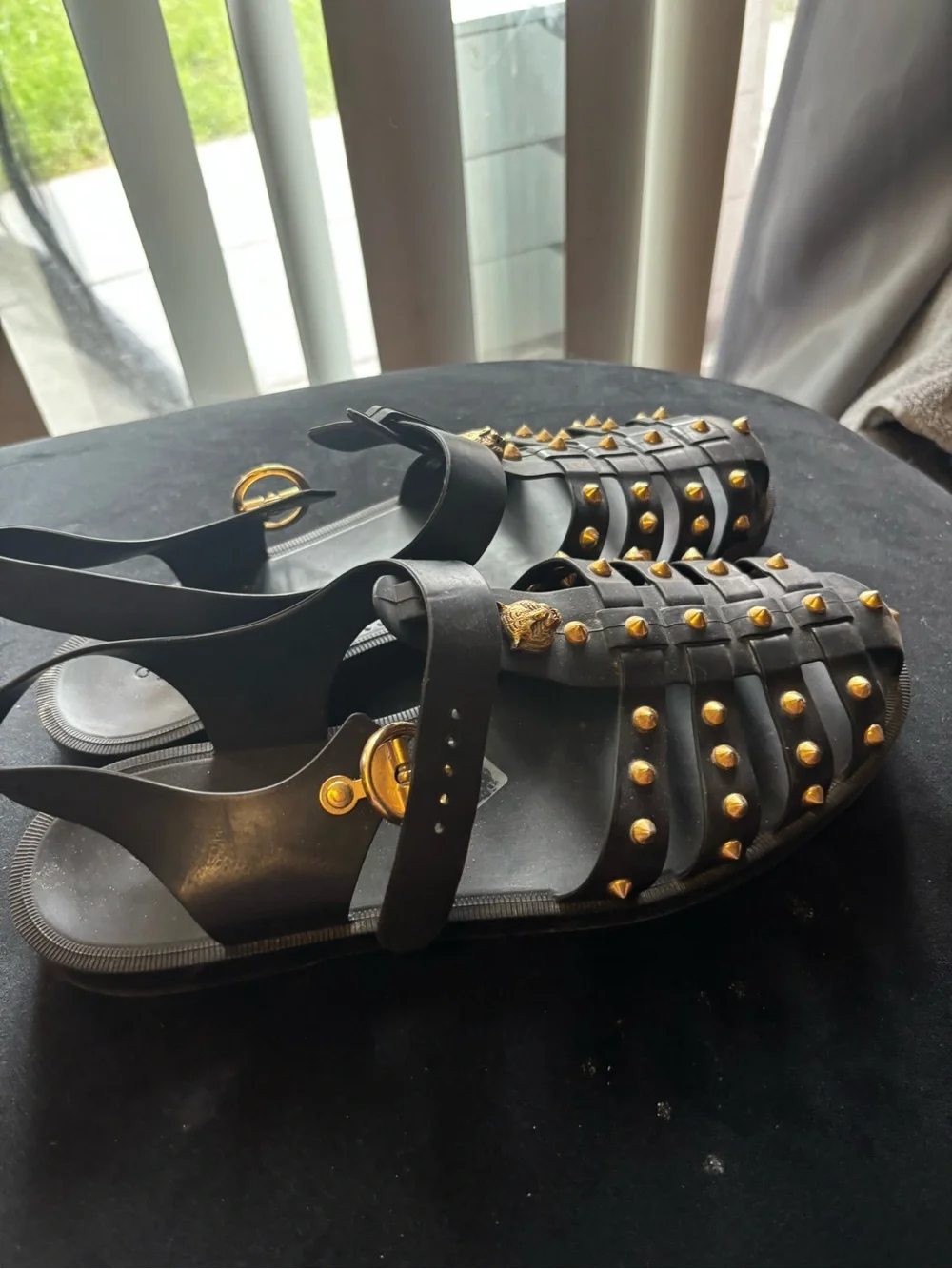 Black Gucci Studded Gladiator Sandals with Gold Accents